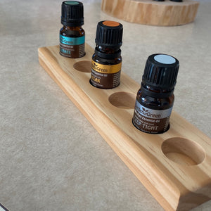 This 6 Hole 10ML Essential Oil Stand made with pine is perfect for conveniently and neatly displaying your favorite essential oils. With six compartments, you can have six different aromas to choose from. Its sleek design and sturdy construction make this stand stylish and reliable. Enjoy its convenience and peace of mind today!