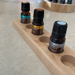 This 6 Hole 10ML Essential Oil Stand made with maple is perfect for conveniently and neatly displaying your favorite essential oils. With six compartments, you can have six different aromas to choose from. Its sleek design and sturdy construction make this stand stylish and reliable. Enjoy its convenience and peace of mind today!