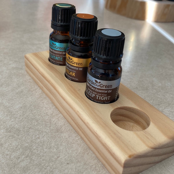 This elegant essential oil display features four 10ml holes, each crafted from quality wood to store and showcase your oils in style. Perfect for home or store displays, this display adds a touch of sophistication to any decor.