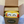 Bar of lemon soap and yellow washcloth with smiley face design in a 'Garden of Green' branded box. great for gifting