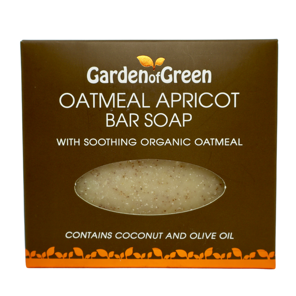 Garden of Green's oatmeal apricot bar soap front view in dark brown box with orange leaf foil on the bottom of box. the background it white