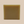 Pachouli bar soap standing up right like a square with a tan background