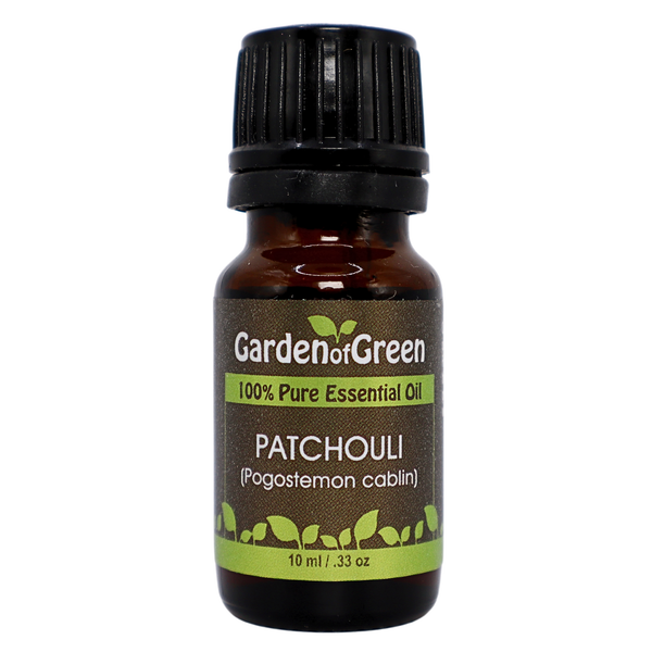 Patchouli essential oil 10 ml front view from garden of green with a white background