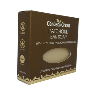 Garden of Green's Patchouli bar soap side view in a dark brown box with a tan foils with leaves on the bottom. on a white background