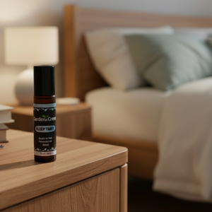 Sleep Tight essential oil roller front view placed on a nightstand 
