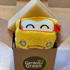 Yellow plush car washcloth (12 x 12) with  a embroidered face and aromatherapy Lavender Soap in a brown box labeled Garden of Green
